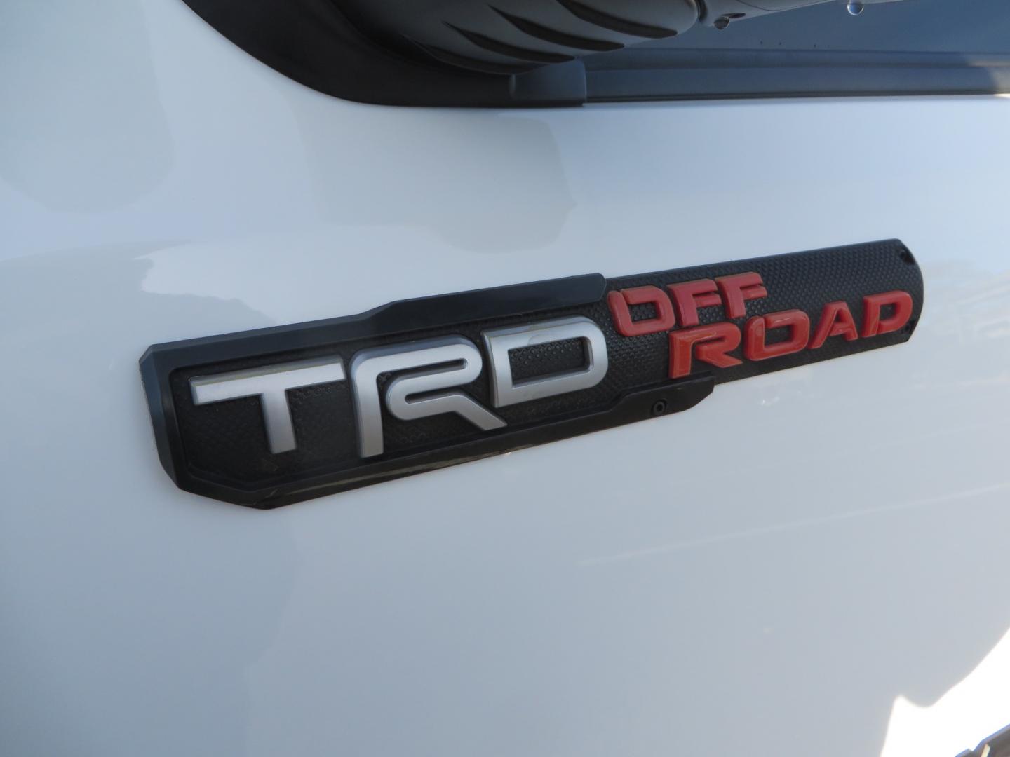 2019 White /black Toyota Tacoma TRD OFF-ROAD Double Cab (3TMAZ5CN4KM) with an 3.5L engine, automatic transmission, located at 2630 Grass Valley Highway, Auburn, CA, 95603, (530) 508-5100, 38.937893, -121.095482 - TRD Offroad 2WD sitting on Fox 2.5 remote reservoir DSC Coil-overs, Total Chaos upper control arms, Rigid Industries Dually side shooter leds, Fuel Rebel wheels, Nitto Ridge Grappler tires, and window tint. - Photo#12